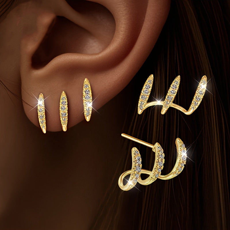 Elegante oorbellen met kristalsteentje in drievoudige zetting