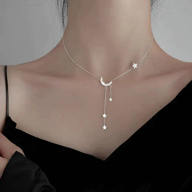 Elegante collier met maan en sterren