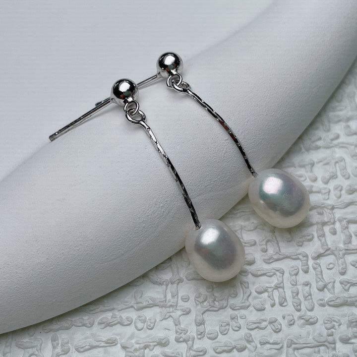 Elegante oorbellen met parelglans
