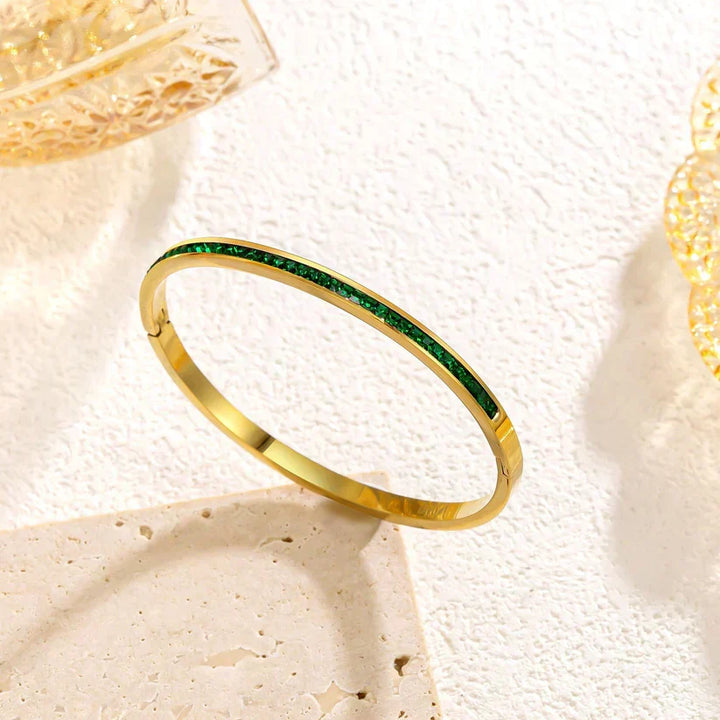 Goudkleurige armband in groen