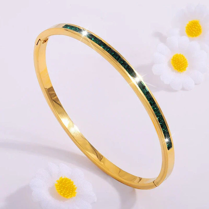 Goudkleurige armband in groen