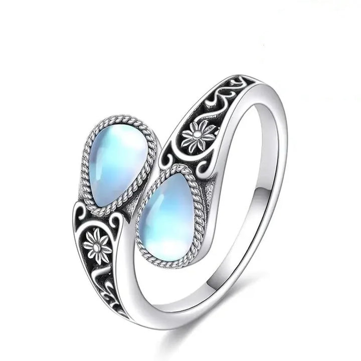Elegante ring met bloem in maansteenlook