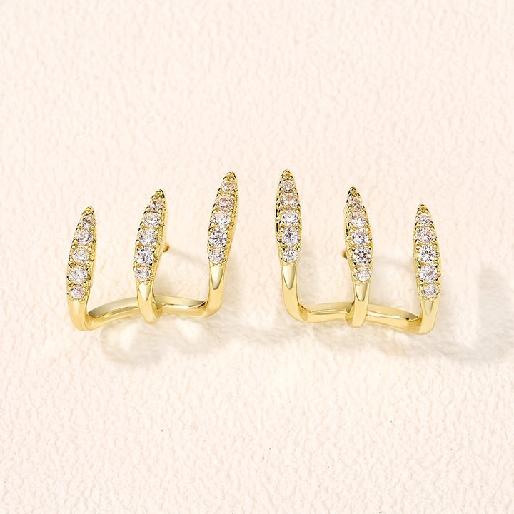 Elegante oorbellen met kristalsteentje in drievoudige zetting