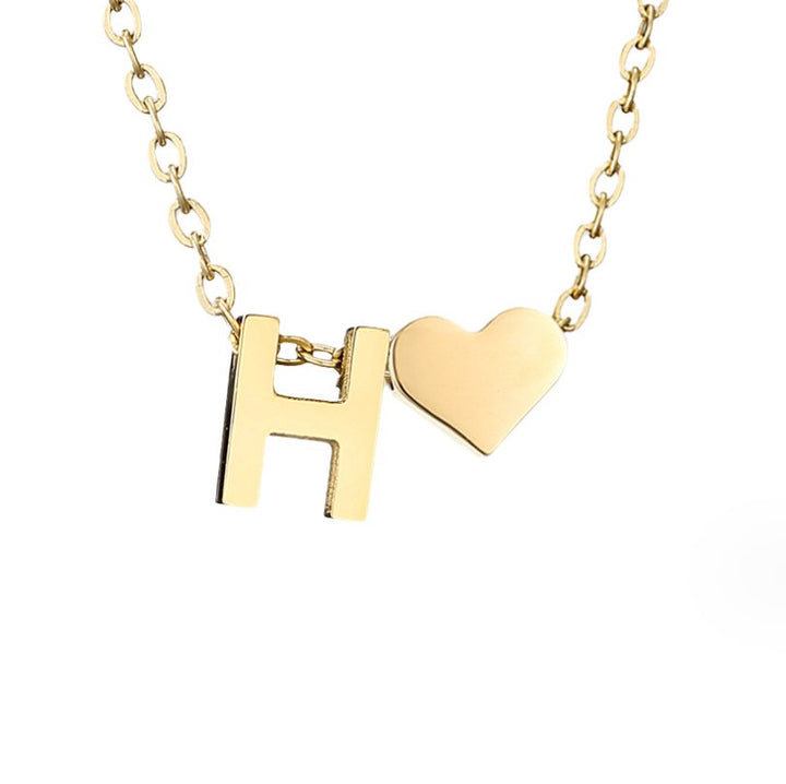 Tijdloze initiaal-ketting met harthanger