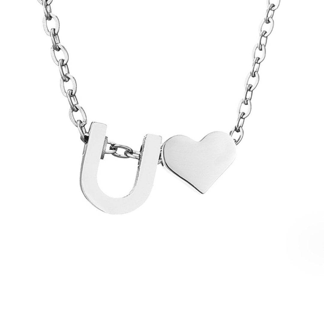 Tijdloze initiaal-ketting met harthanger