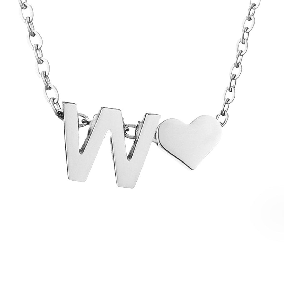 Tijdloze initiaal-ketting met harthanger