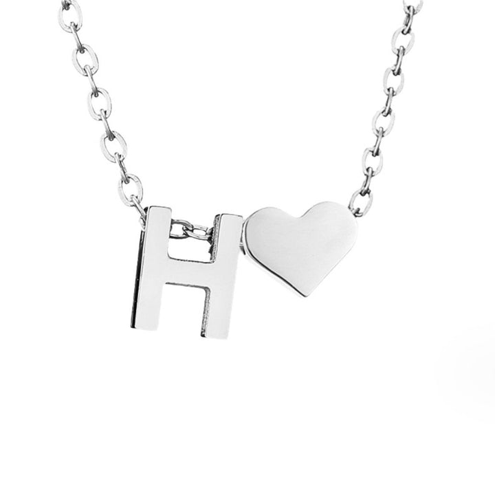 Tijdloze initiaal-ketting met harthanger