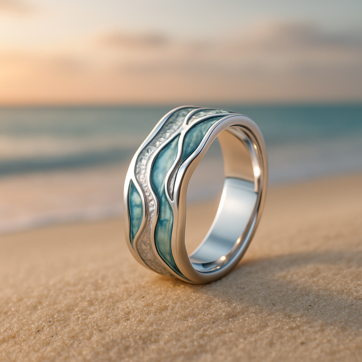 Zilverkleurige ring met turkooiskleurige golven