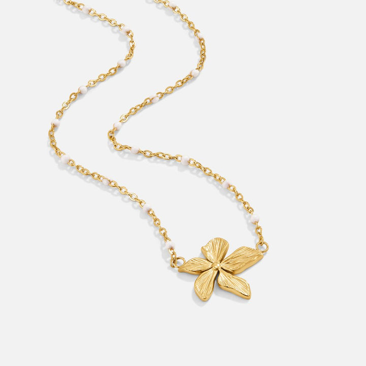 Elegante ketting met goudkleurige bloem