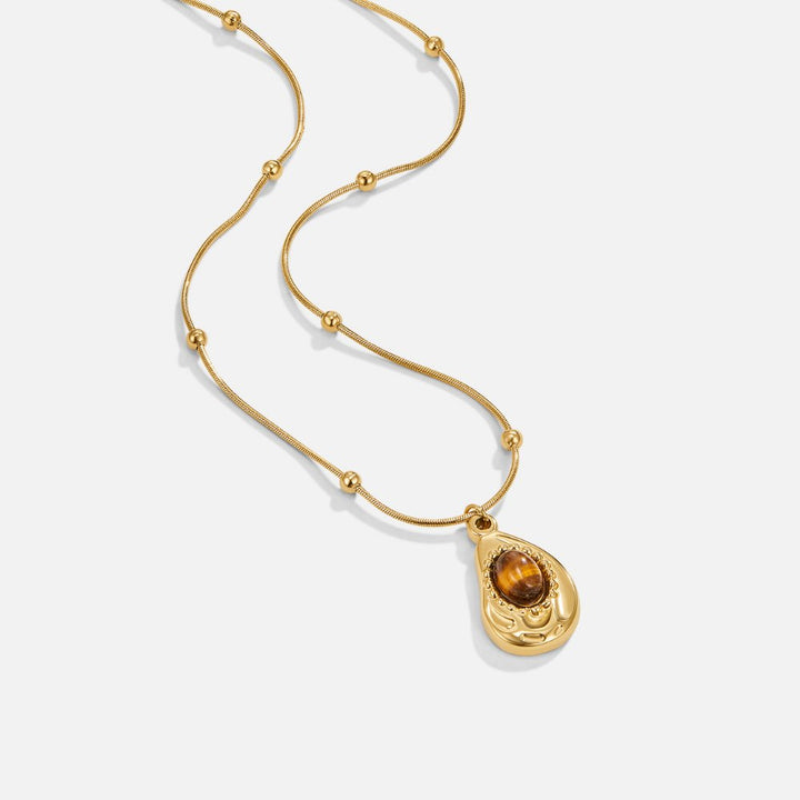 Elegante goudkleurige ketting met tijgeroog-steen